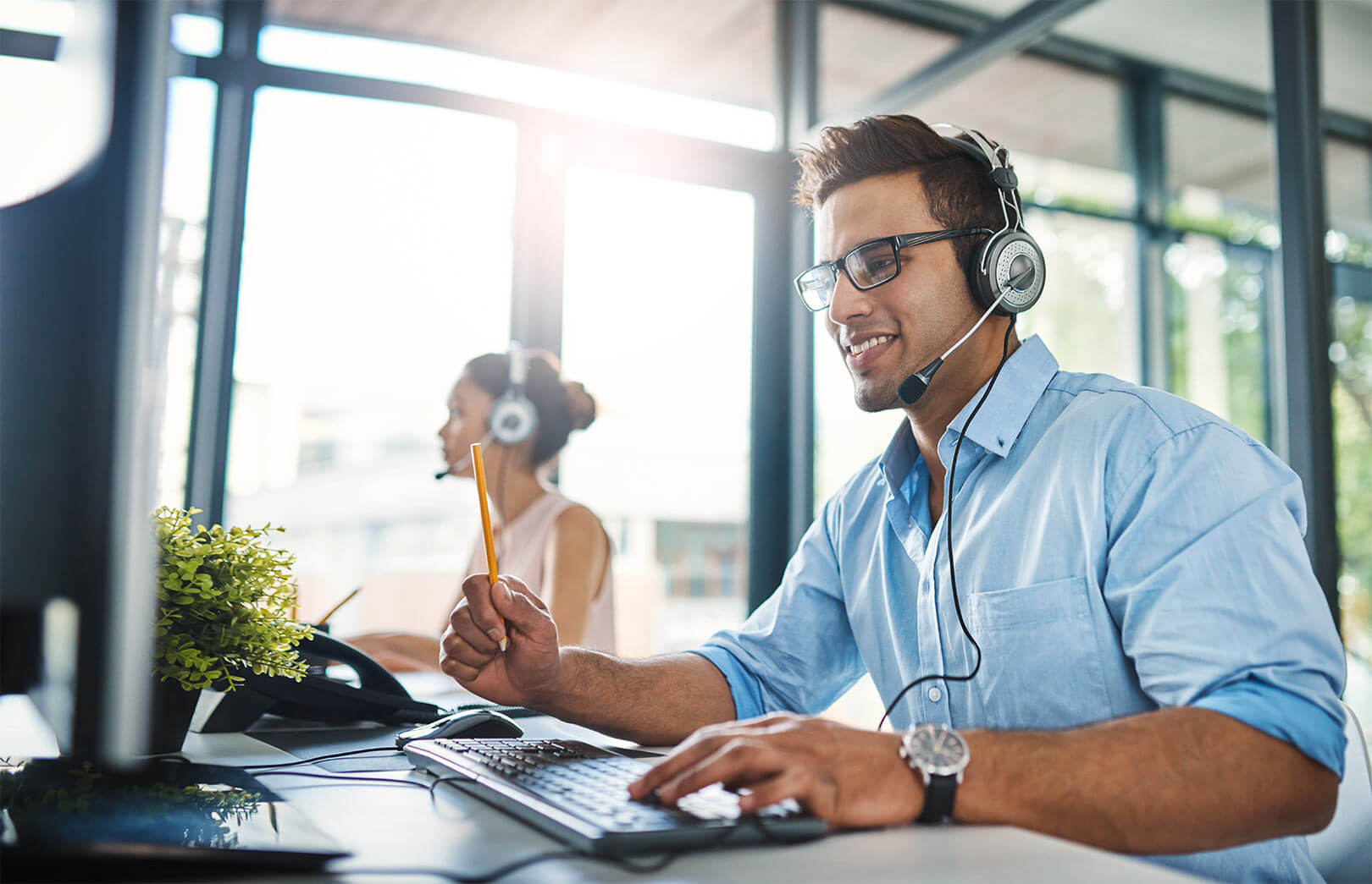 Trained assistant on a headset in a title operation