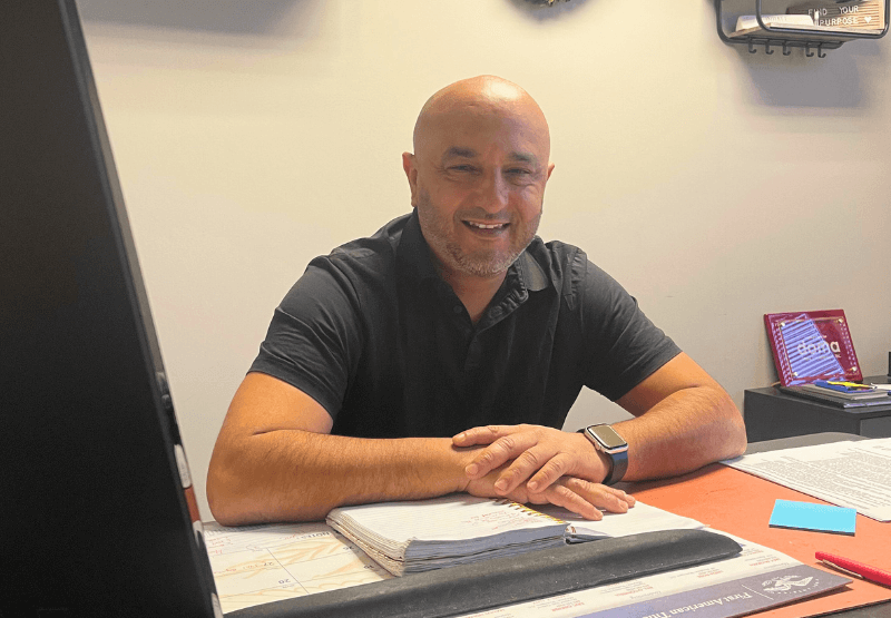 Settlement officer working at his desk